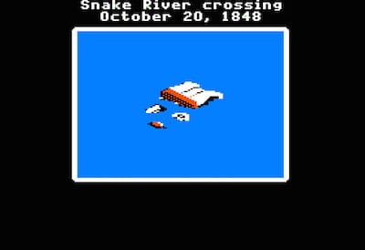 Screenshot of wagon tipped over in a river