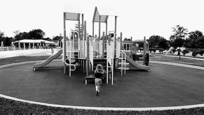 Girl running toward playground