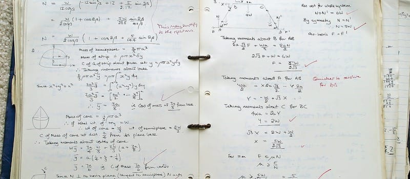 Math notebook with complicated formulas