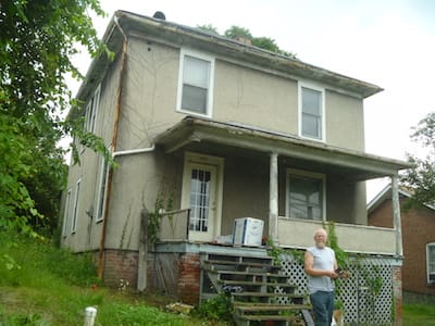 Run-down two story house