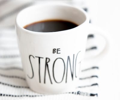 Coffee mug with words "Be Strong"