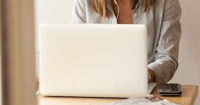 Woman working on laptop computer