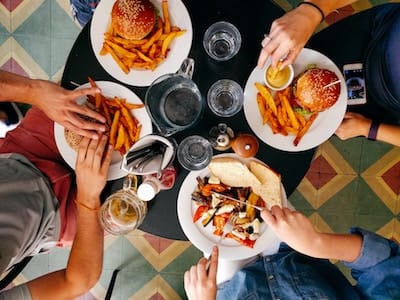 Friends eating together