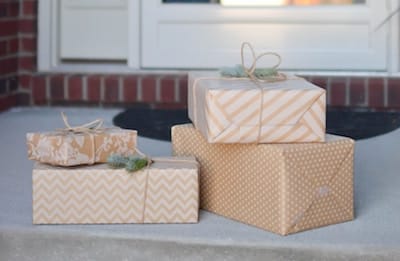 Gift-wrapped packages on a doorstep