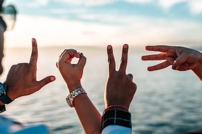 Hands spelling out the word Love