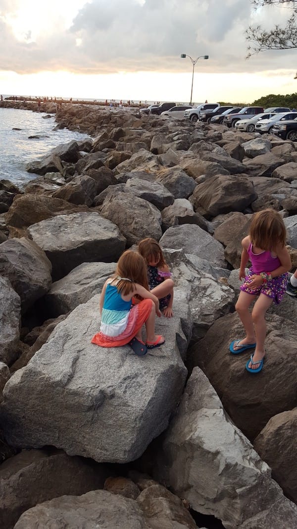 Our daughters climbing the rocks on Venice island