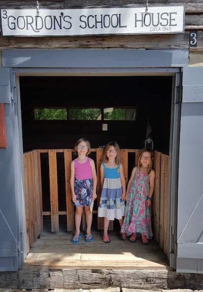 Girls at an old schoolhouse on our road trip