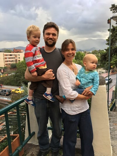 Ellen, Michael and their two kids on a bridge