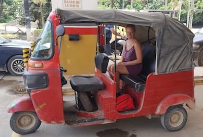 Jaime riding in a Tuk Tuk