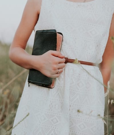 Woman holding bible