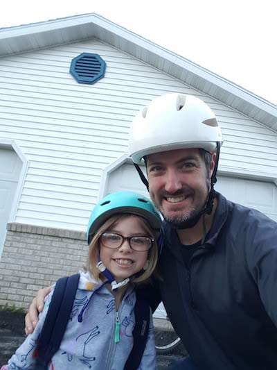 Getting ready to bike with my oldest daughter